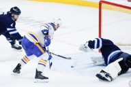 Eric Comrie (34 saves) guides Jets to win over Sabres - The Rink Live | Coverage of youth, junior, high school and college hockey