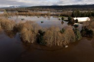 Record flooding possible in Pacific Northwest as storms continue in Northeast
