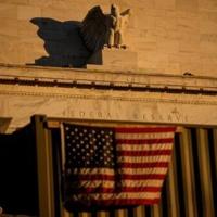 Stocks diverge as AI fears cloud US rate cut