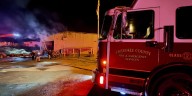 Commercial fire shuts down street in Cherokee County, officials say