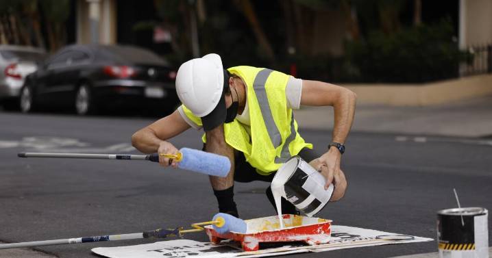 Activists paint Westwood crosswalk to improve safety. Police shut down effort, cite volunteer for vandalism