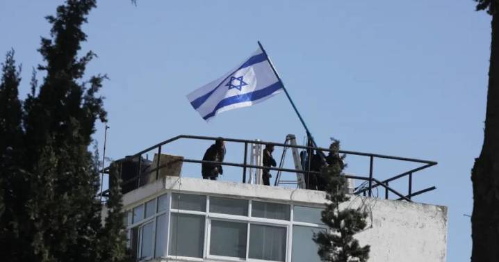 Israel 'breaches international law' as troops storm UN compound