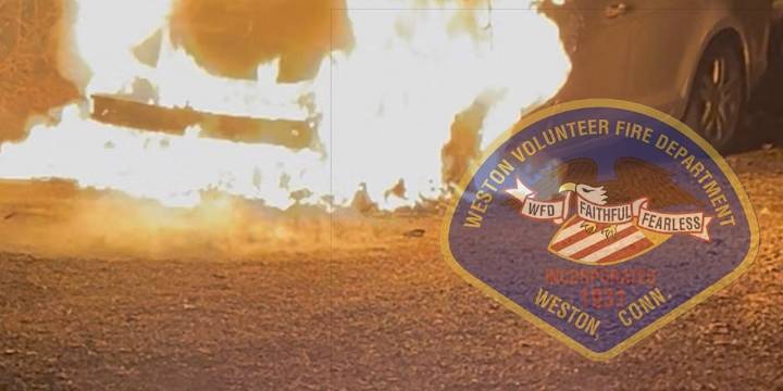Firefighters extinguish car fire in Weston