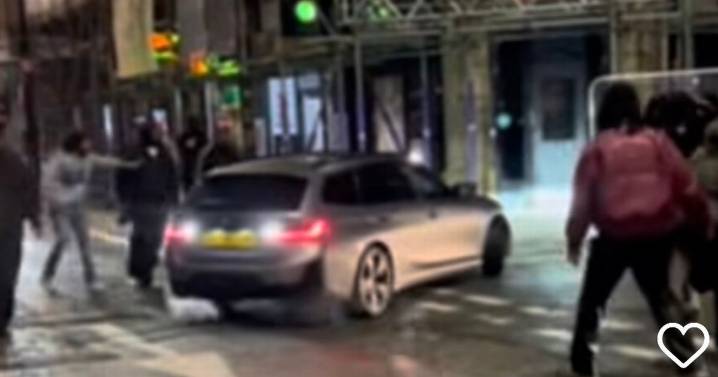 Horror moment screams heard as car 'driven at pedestrians' on Deansgate
