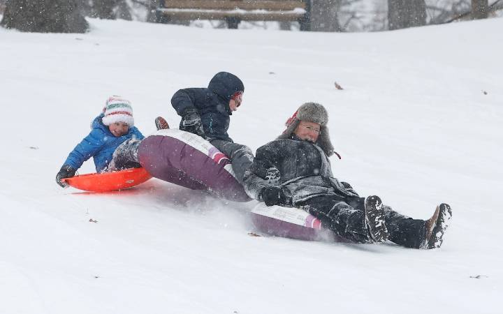 Snow will continue to batter Central New York tonight and into Friday