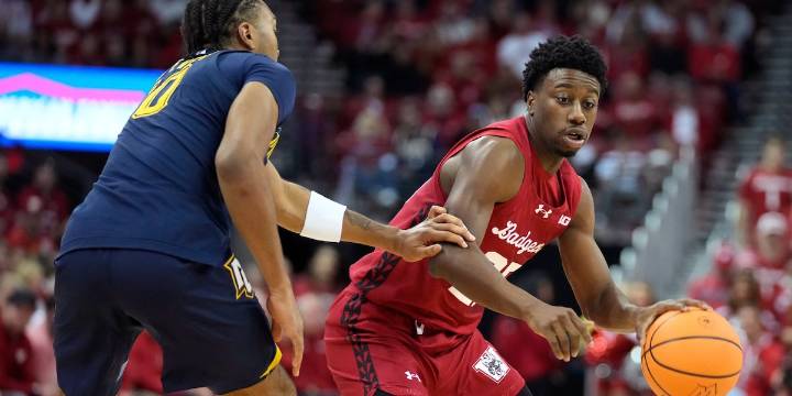 John Blackwell scores 30 to guide Wisconsin to 96