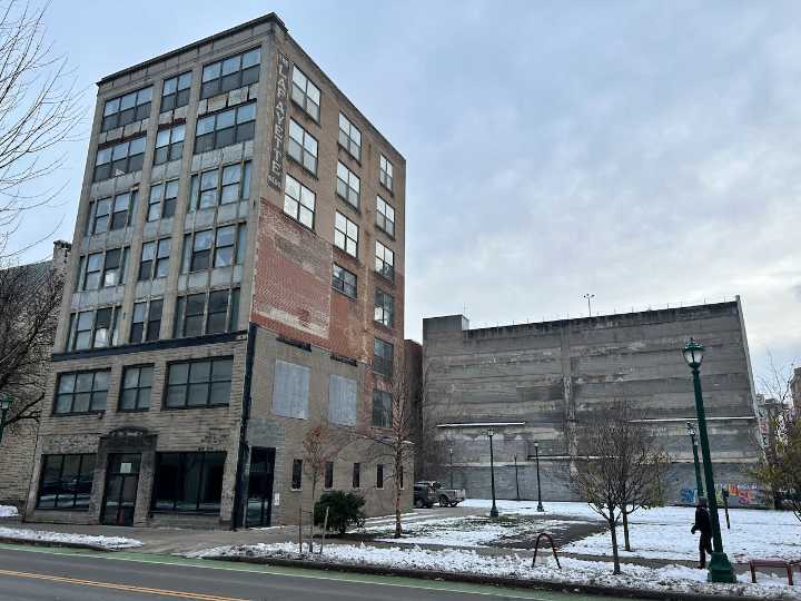 Downtown building owner sues to pause work on massive new Syracuse hotel