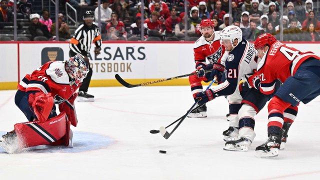 Thompson makes 39 saves for 100th NHL win, Capitals shut out Blue Jackets
