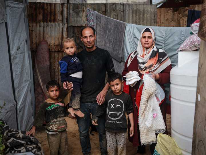 From war to winter: Gaza couple wait to welcome baby in flooded tent