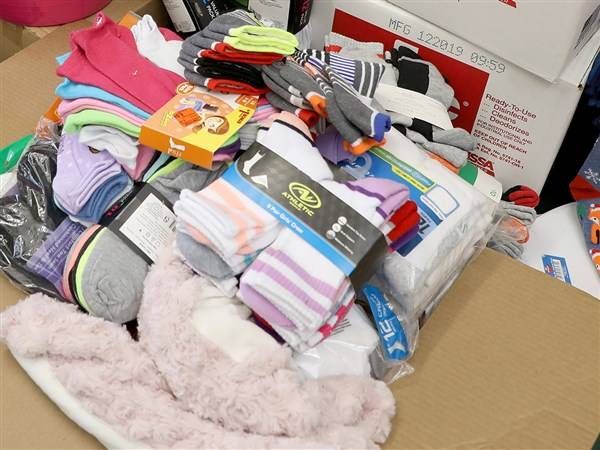 United Way shelf stocker event to create cold-weather and hygiene kits