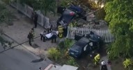 Four injured after two‑car crash tears through North Miami yard