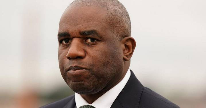 Two prisoners remain at large after being released in error, David Lammy admits