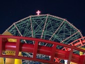 Cross placed atop Wonder Wheel lights up for different causes
