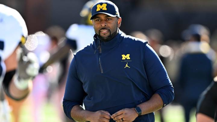 Why was Michigan’s coach fired and arrested this week?