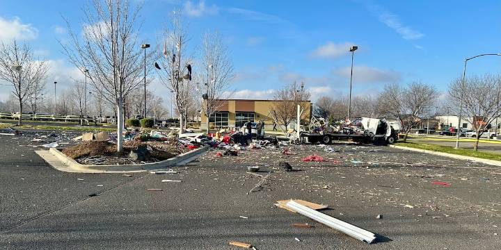 One person dead after U-Haul truck explodes in shopping center parking lot, officials say