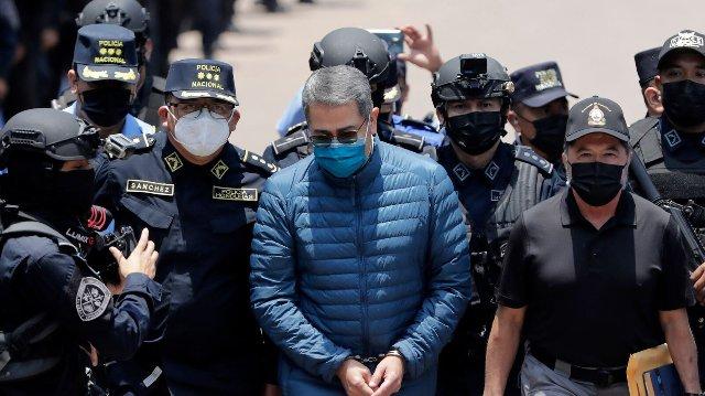 Former Honduran President Juan Orlando Hernandez freed from prison after Trump pardons drug trafficking conviction
