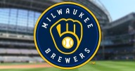 Brewers deal OF Collins, RHP Mears to Royals