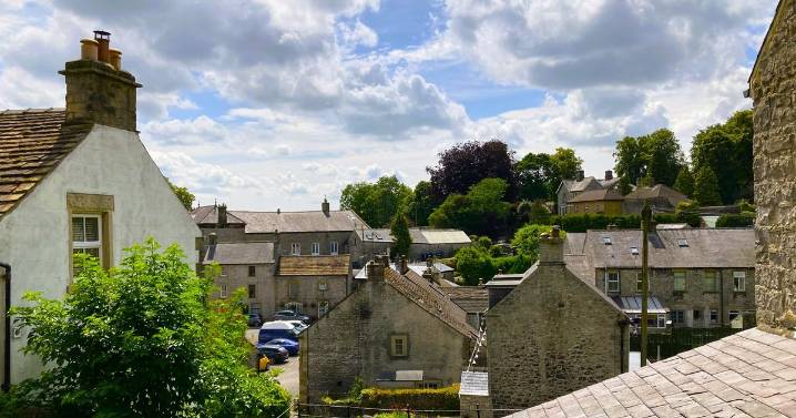 Magical ancient Peak District village packed with cosy pubs and independent shops