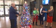 Christmas tree honoring local heroes lights up Baton Rouge City Hall