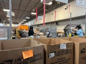 How does the United States Postal Service handle the holiday surge?