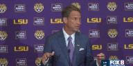 LSU's contract for Lane Kiffin pays at least $13 million annually, though coach claims money not a factor