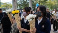 Hong Kong fire probe reveals unsafe netting as public mourns and government stifles dissent