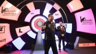 Singapore's Paul Lim, 71, becomes oldest winner of match at World Darts Championship