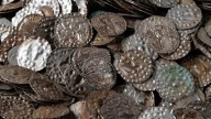 20,000 Silver Coins Found On A Regular Worm Hunt Day by fisherman