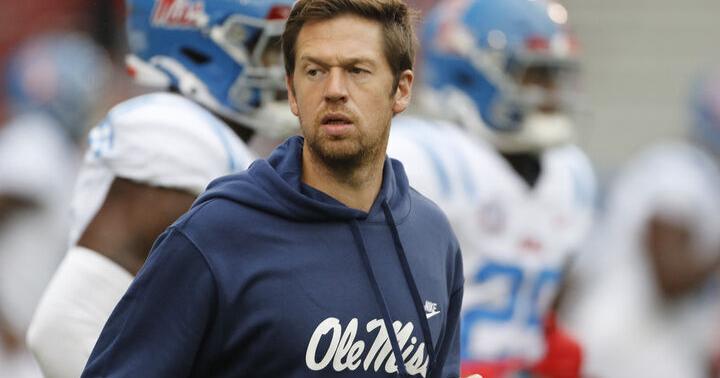 LSU struck new deal with offensive coordinator Charlie Weis Jr. after lingering Ole Miss interest