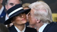 Melania & Donald Trump's Post-Thanksgiving PDA Looked Faker Than His Muddy Tan