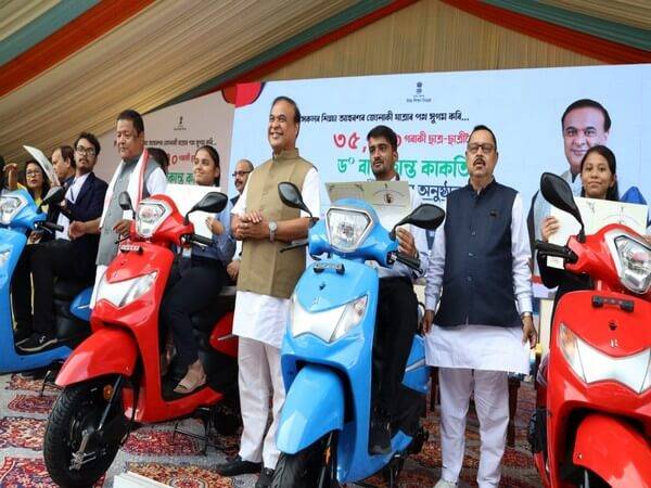 Assam CM distributes scooters to 11,250 students who scored over 80% in higher secondary exams