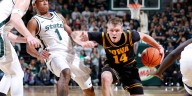 No. 7 Michigan St beats Iowa 71-52 to open defense of Big Ten title
