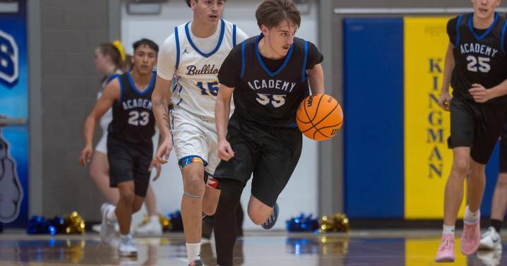 Kingman Academy boys basketball takes down Kingman for first win of the season
