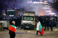Bulgaria’s government resigns as large public protests grip the nation weeks before joining eurozone