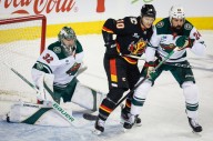 Flames dominate late to douse Wild point streak