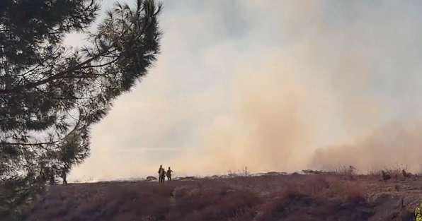 Lanes of 15 Freeway closed in Cajon Pass after fiery crash involving two semi trucks