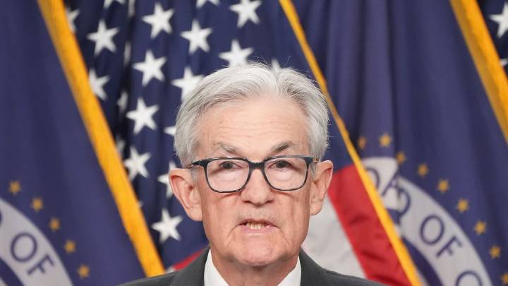 Federal Reserve cuts key rate, sees healthier economy next year