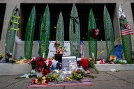 Critically wounded National Guard member being moved to in