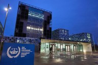 Cut off by their banks, sanctioned ICC staffers remain resolute