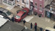 Officer hit by car that struck North Philly home, source says