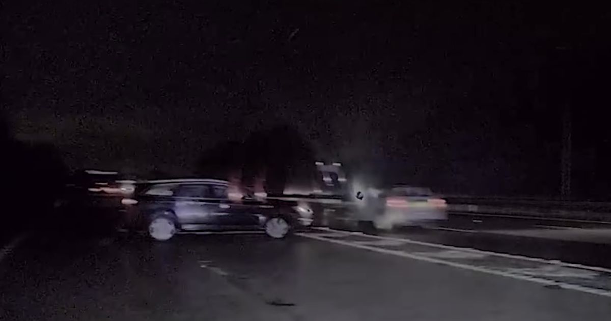 Moment driver makes U-turn on M62 to try and escape police