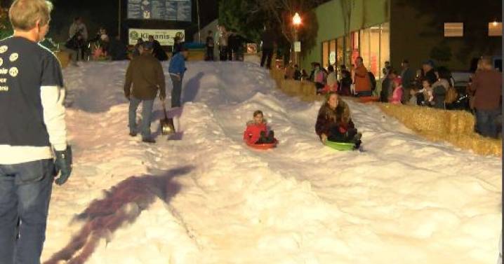 Downtown Atascadero transforms for Winter Wonderland event with a snow slide