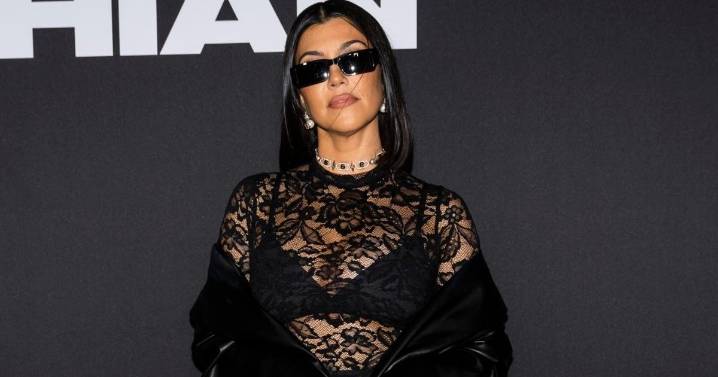 Kourtney Kardashian Goes Bold for Holidays in Sheer Skirt Elf Look