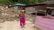 Mother recounts escape from landslide amid Indonesia floods