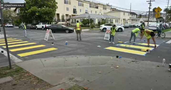 Vigilante volunteer who paints crosswalks at dangerous LA intersections arrested for vandalism