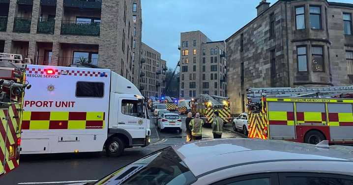 Huge fire at Glasgow flats as crews work to extinguish blaze