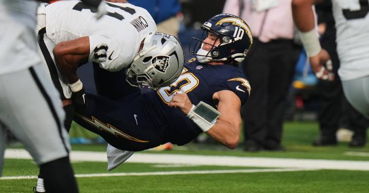 Chargers QB Justin Herbert breaks bone in left hand, but he's optimistic about playing next week