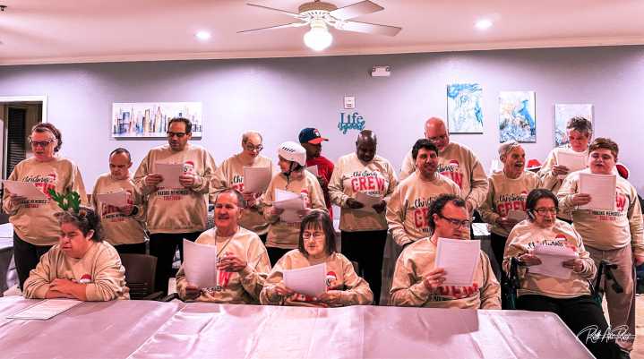 Carolers Welcome Visitors to The Independence Village