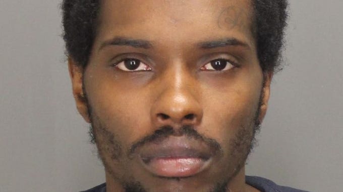 Stepson charged in murder of Pontiac man found in truck with salt spreader