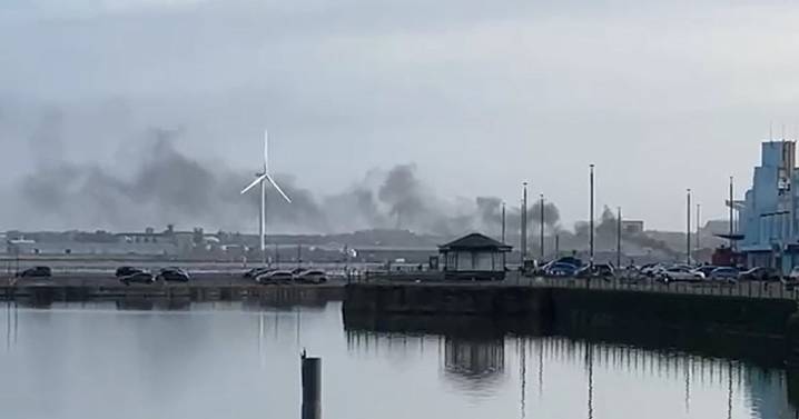 Plumes of smoke spotted over River Mersey as fire service issue statement